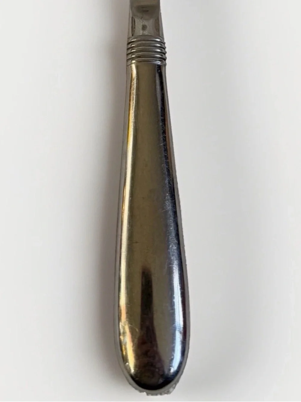 Oneida Mercutio Slotted Serving Spoon 18/8 Stainless Glossy Flared Tip